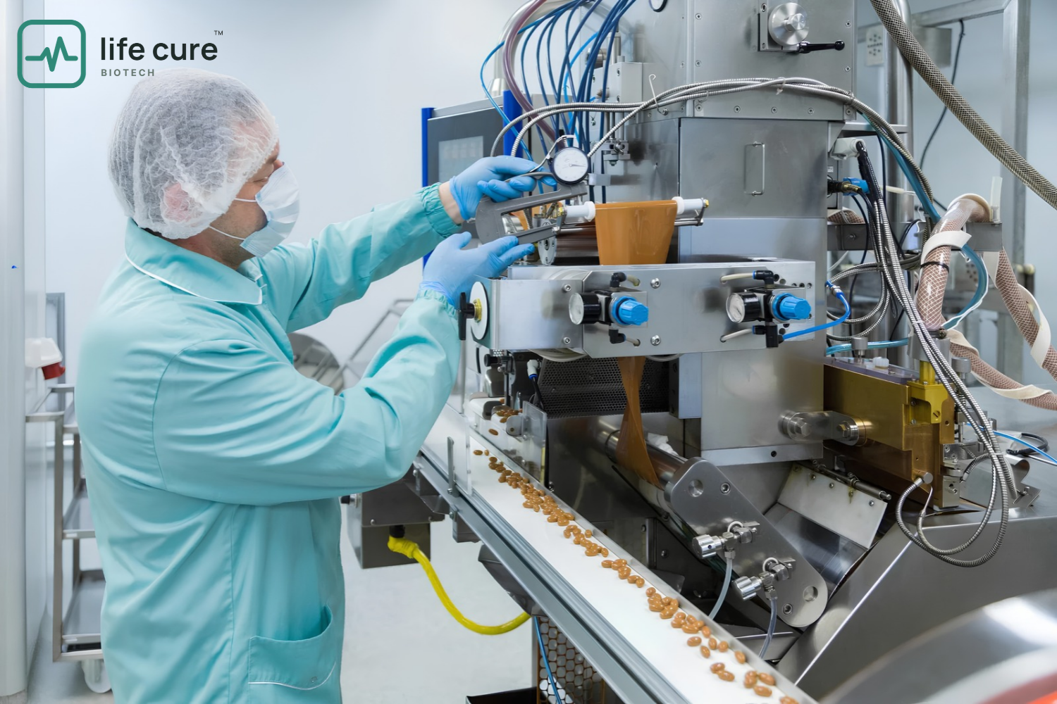 Pharmaceutical production line operator in cleanroom clothing